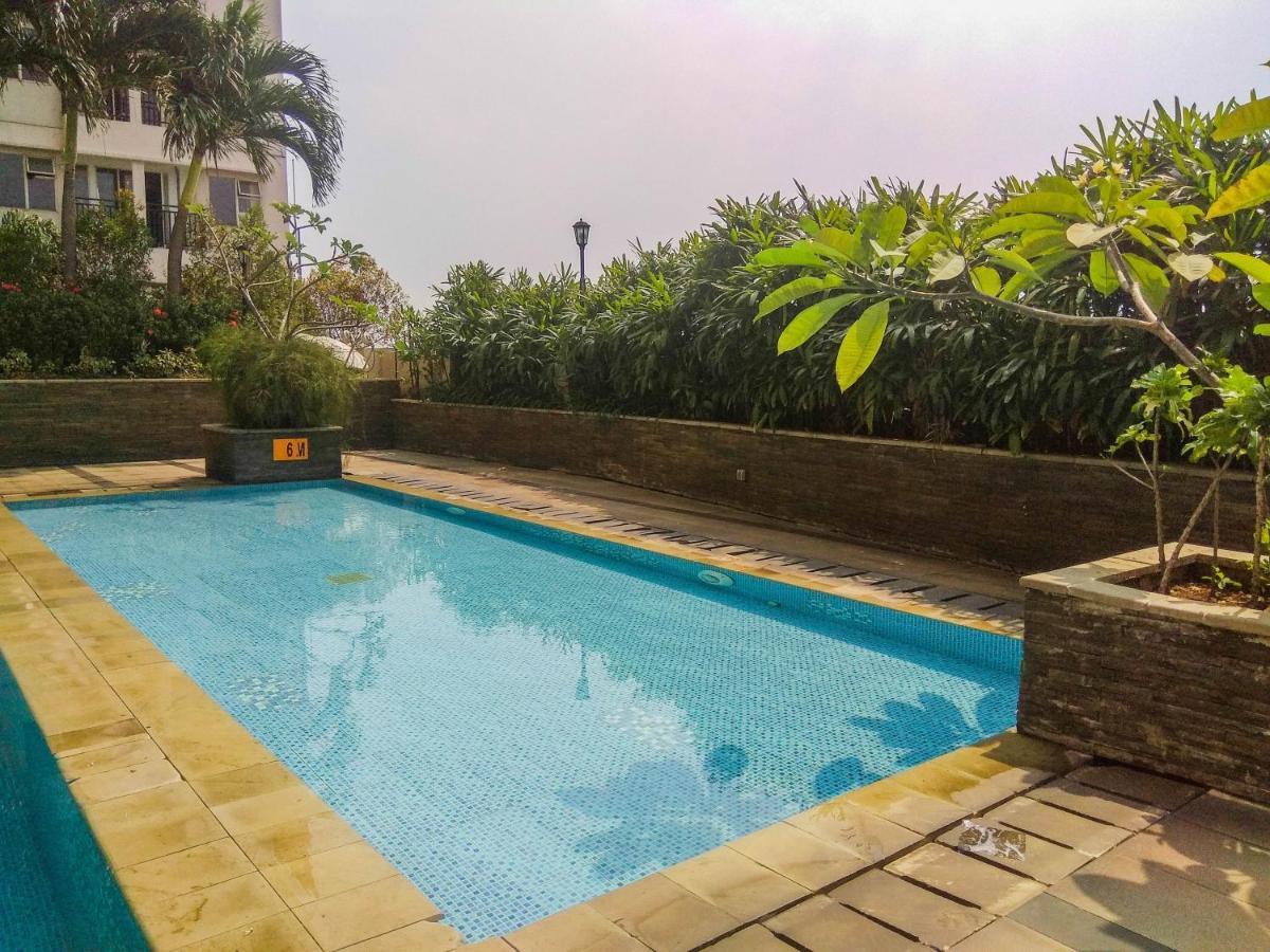 Cozy Pool View Studio Apartment At Margonda Residence 3 By Travelio Kemirimuka Tiga Dış mekan fotoğraf
